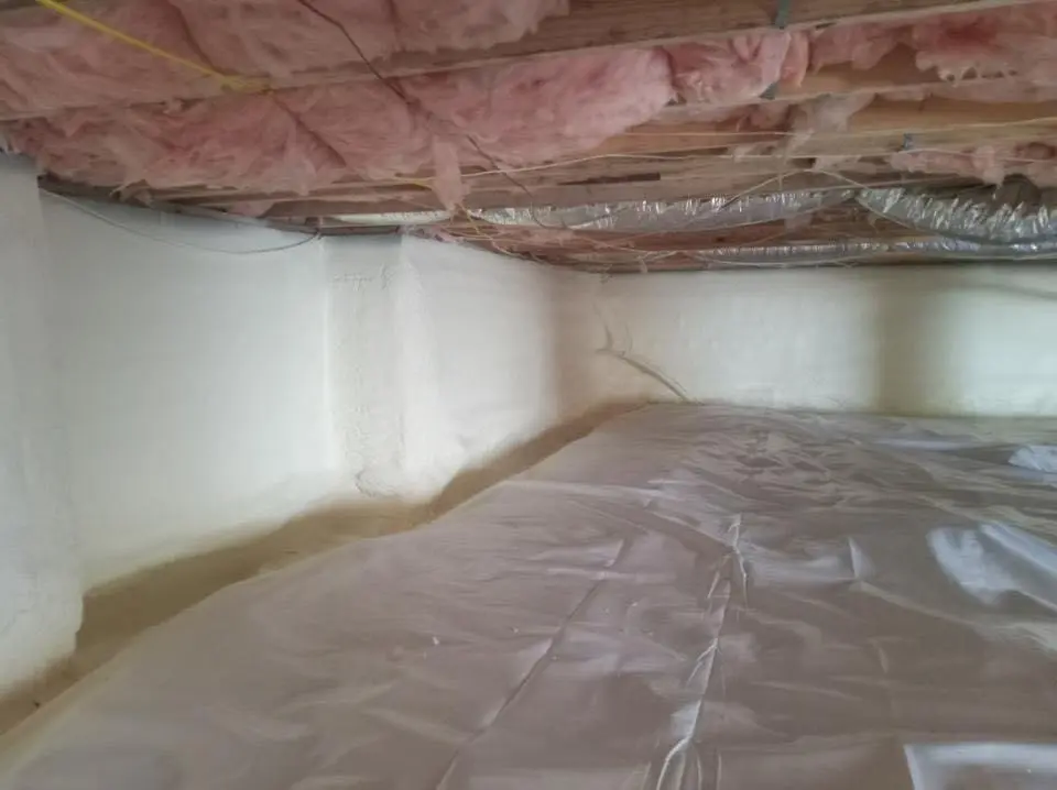 Crawl space encapsulation with closed-cell spray foam for Commercial Roof Restoration in Bolivar